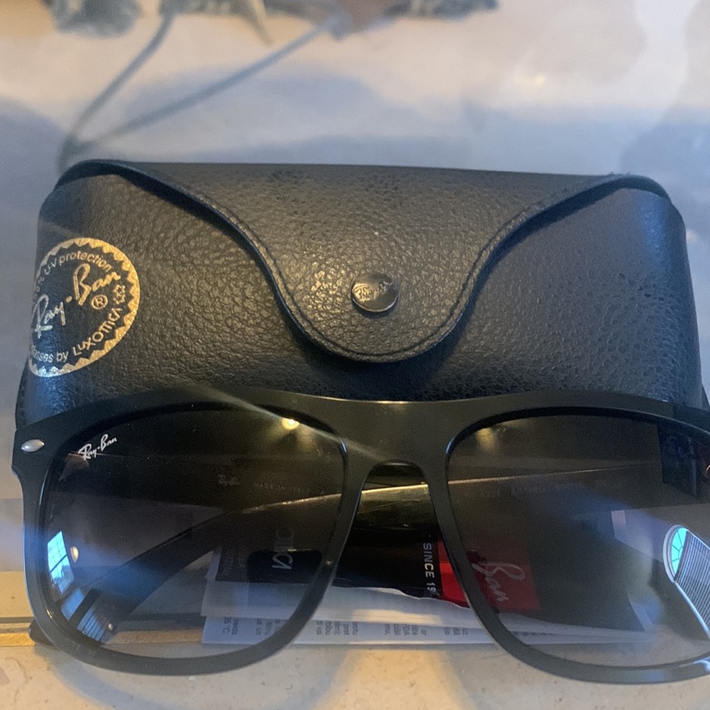 Ray Ban Sunglasses. Retail I paid 175.00 saw the same pair online 158.00. New - Picture 2 of 4